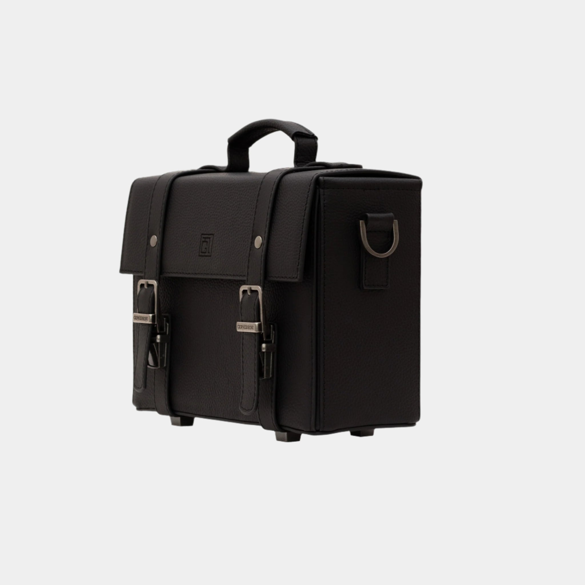 Angled side view showcasing the boxy silhouette and silver hardware of the Dobby bag
