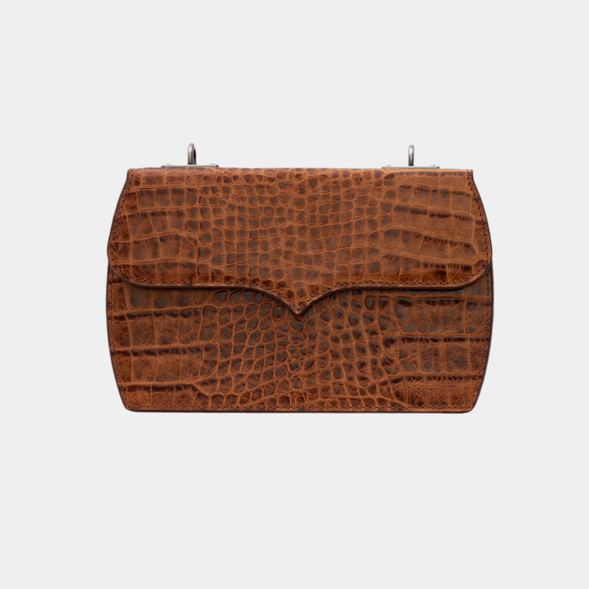 Front view of Gepherrini Gabriella crossbody bag in cognac crocodile-textured leather