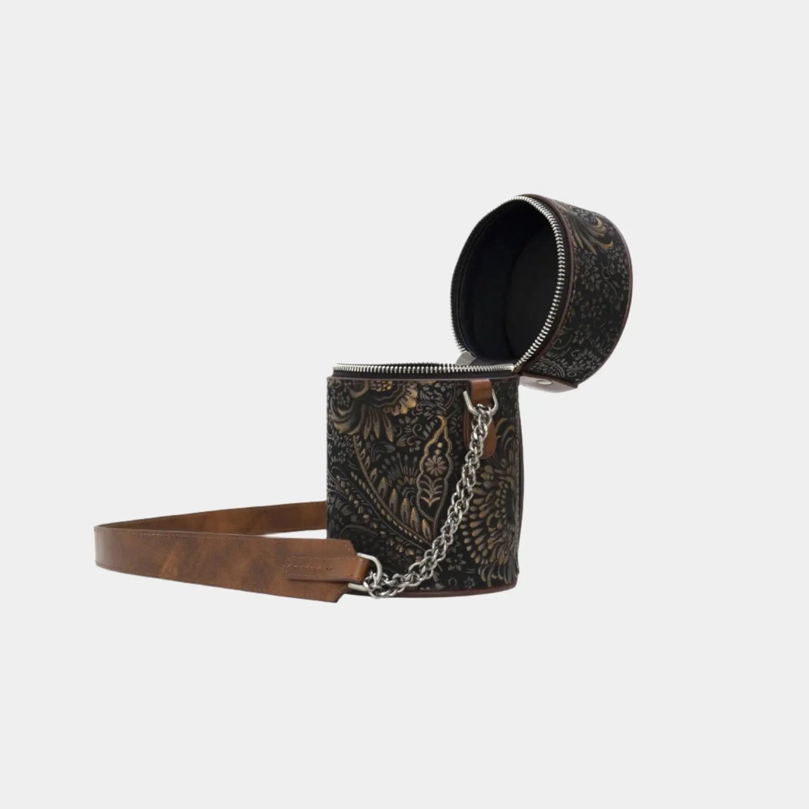 Baia handbag top lid open with visible zipper and engraved baroque leather pattern
