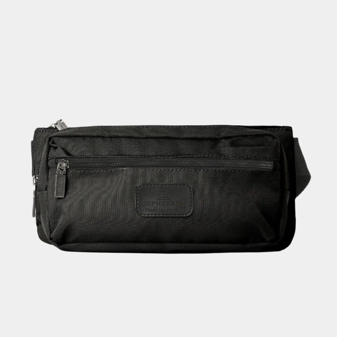 Front view of Bellamy crossbody belt bag in black technical fabric with zippered compartments