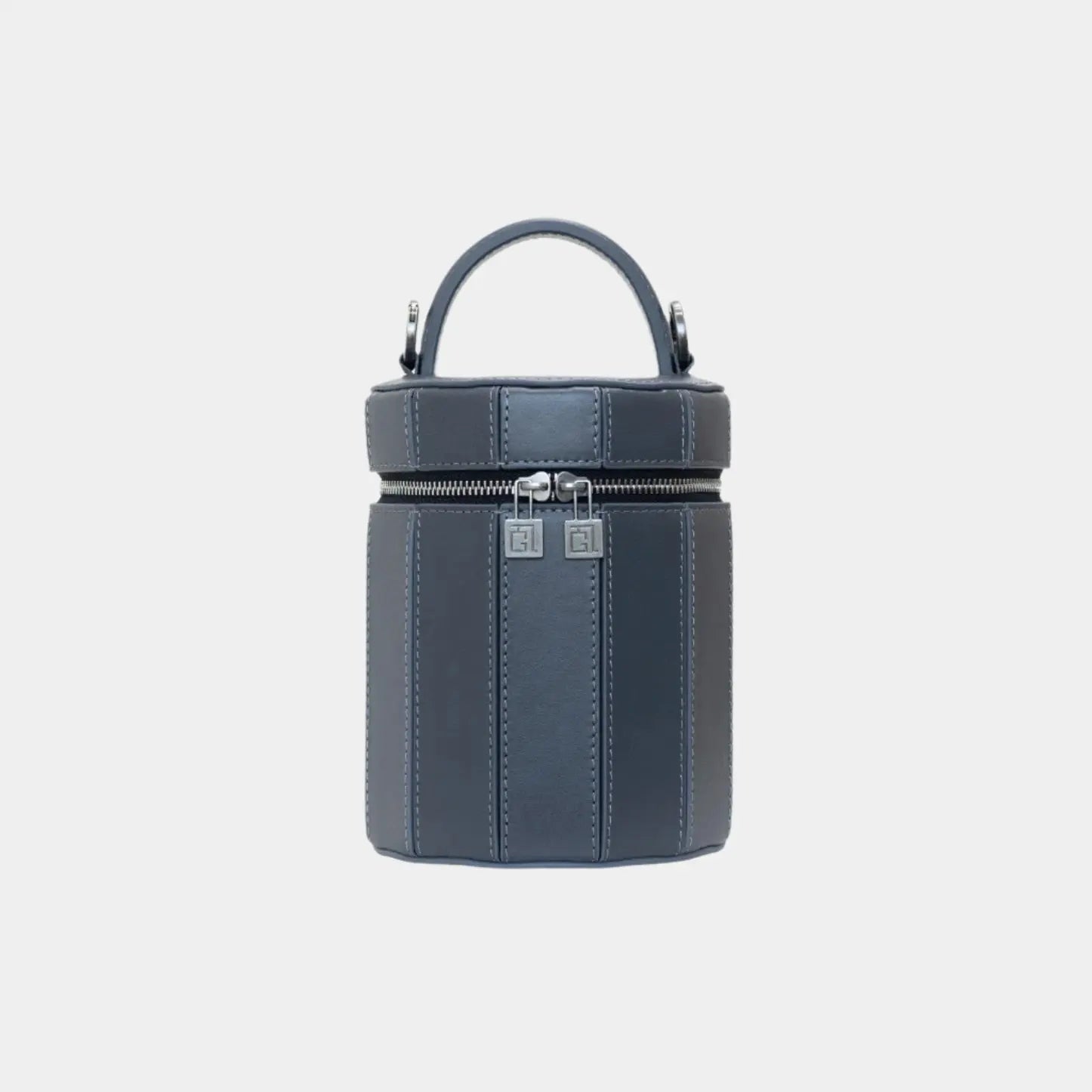 Front view of Eleanor handbag in soft blue leather with wide flap and curved silhouette