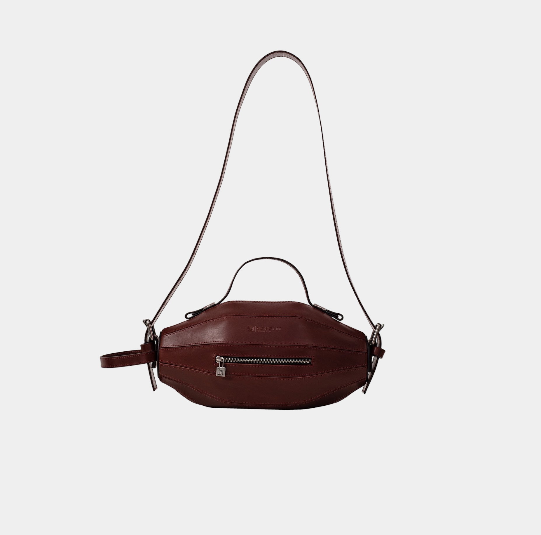 Ellisse Bag shown with long adjustable shoulder strap, showcasing multi-wear functionality.