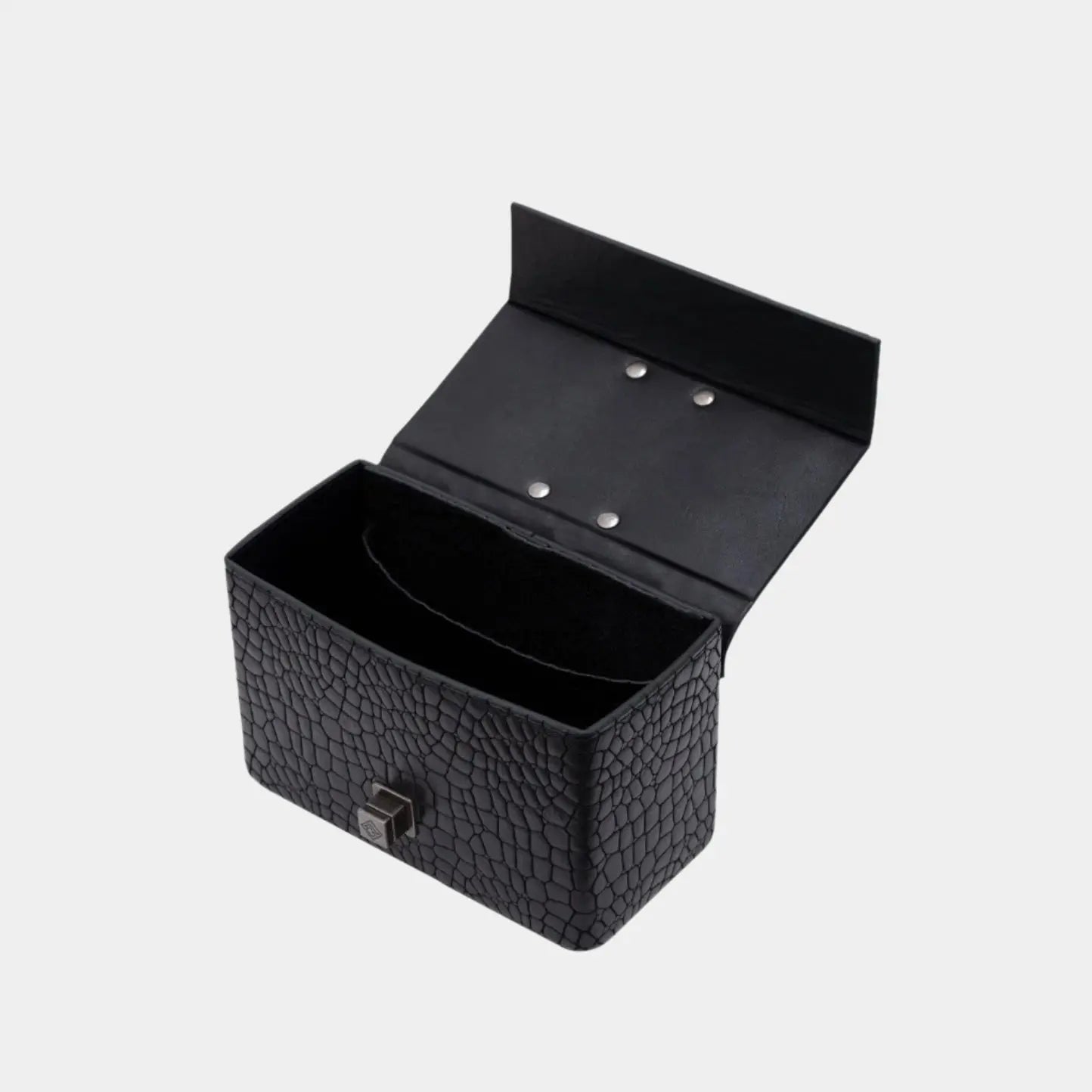 Open Genesis handbag showcasing structured interior and suede lining in classic black