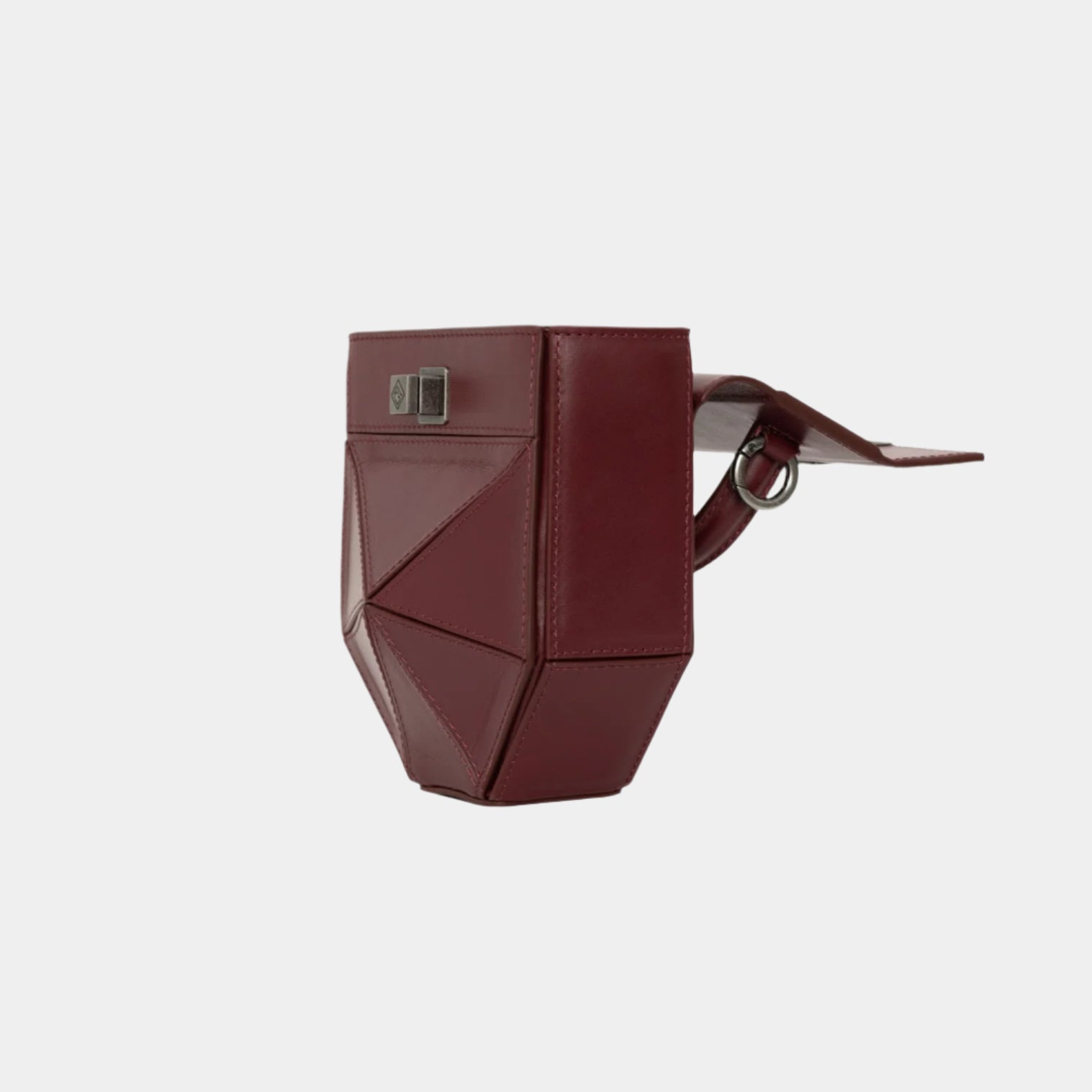 Open burgundy Isla bag showing top flap and structured side panels