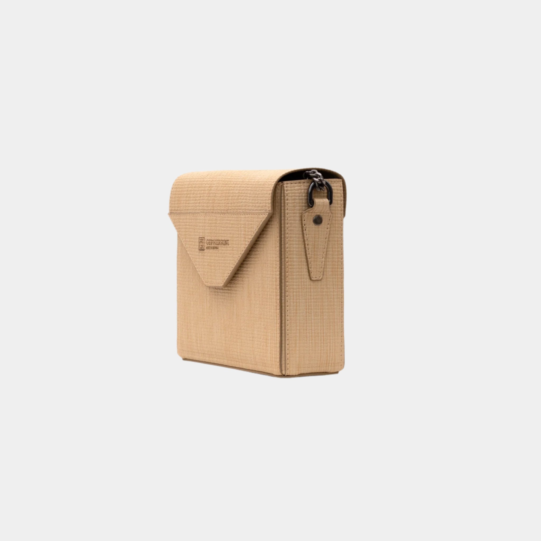 Side view of Gepherrini Nisa beige crossbody with textured finish