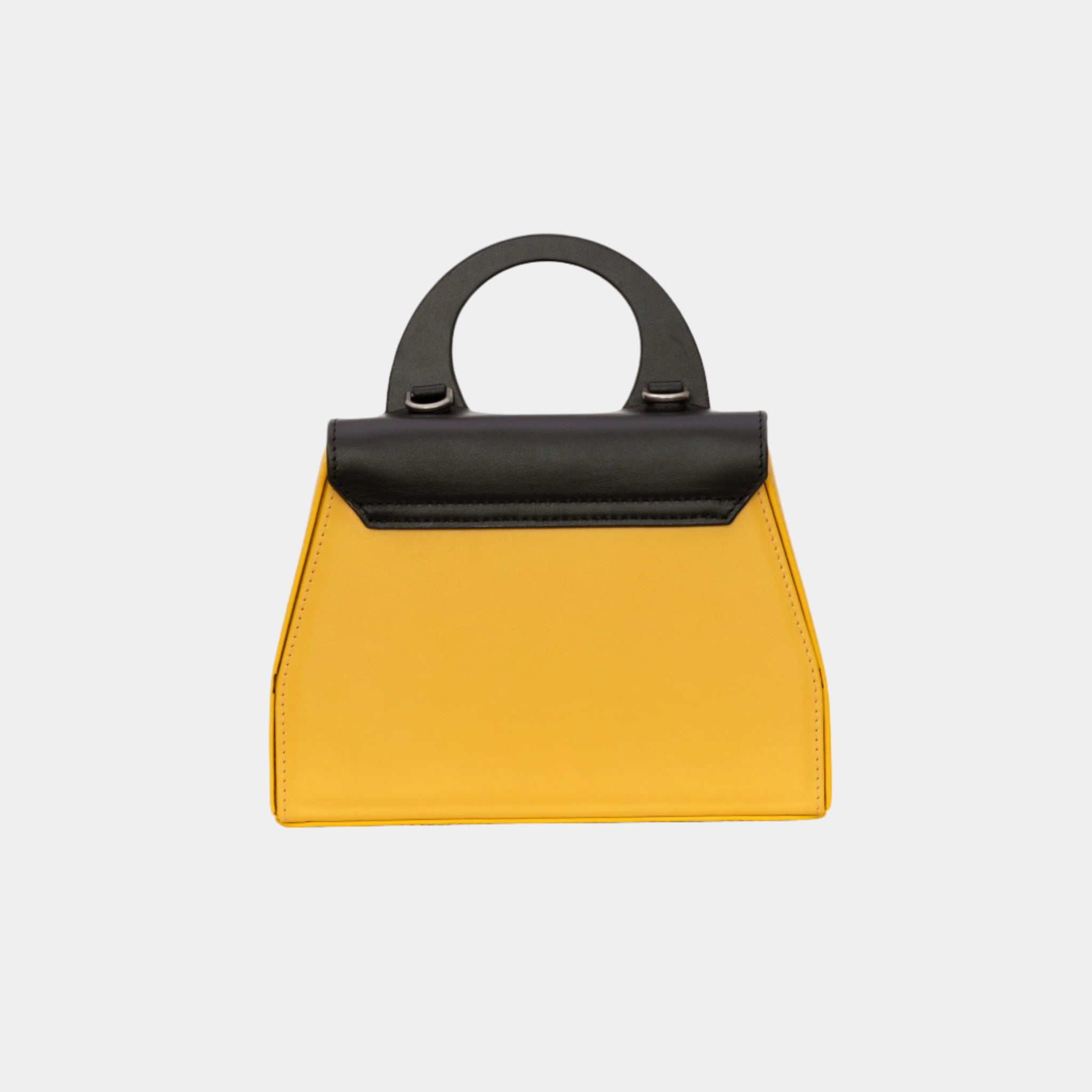 Back of Twiggy yellow leather handbag with smooth black top handle