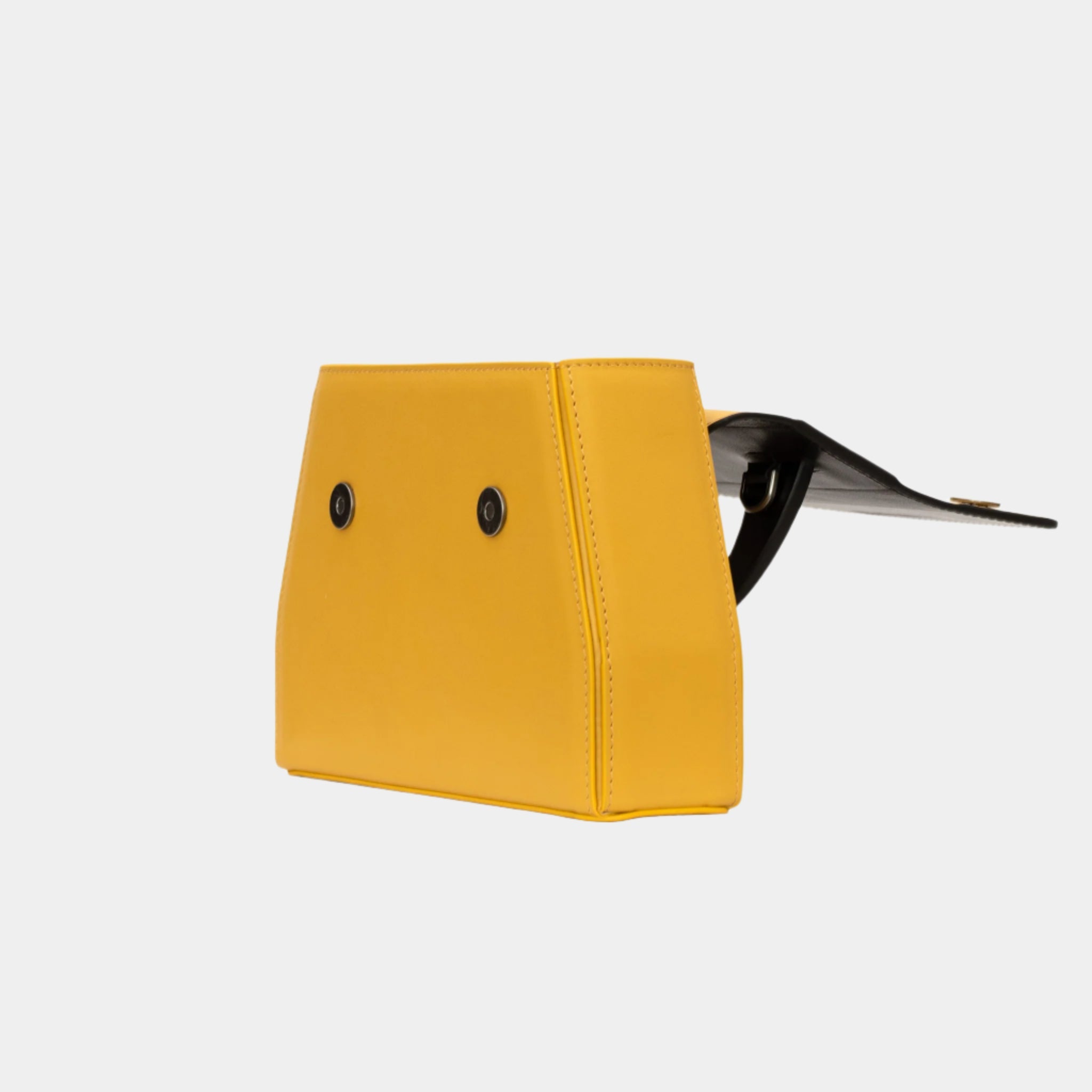 Twiggy leather handbag in yellow, open with interior and bottom details visible